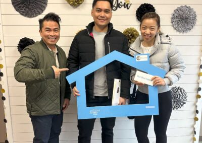eugene with couple who just purchased a property